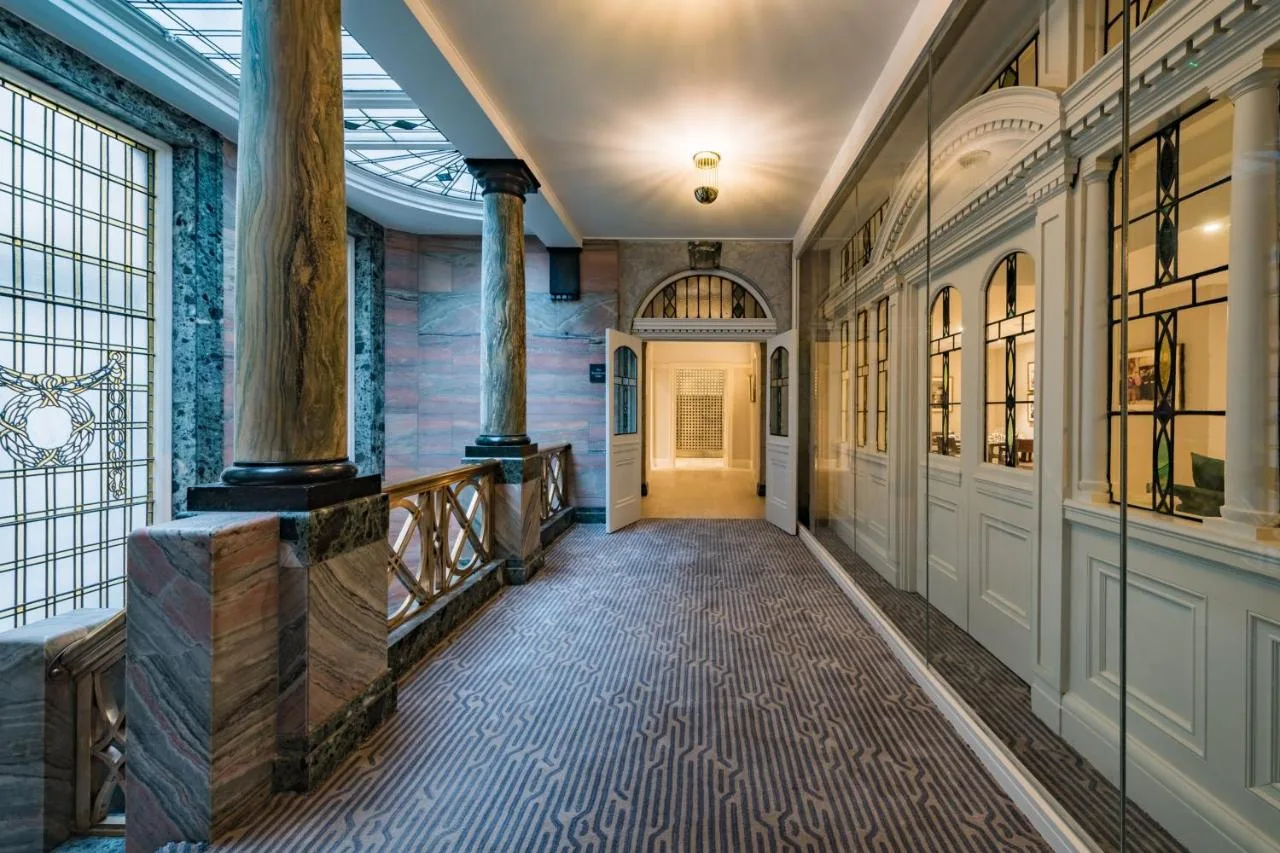 a hallway of a building with at Stock Exchange Hotel, Manchester, Autograph Collection in Manchester